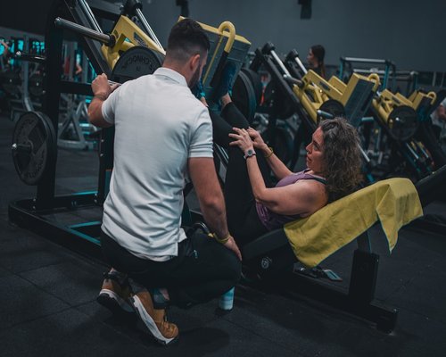 people working out together gently in a modern gym